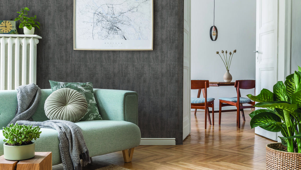Novelio Concrete Berlin: la texture della parete in un soggiorno luminoso